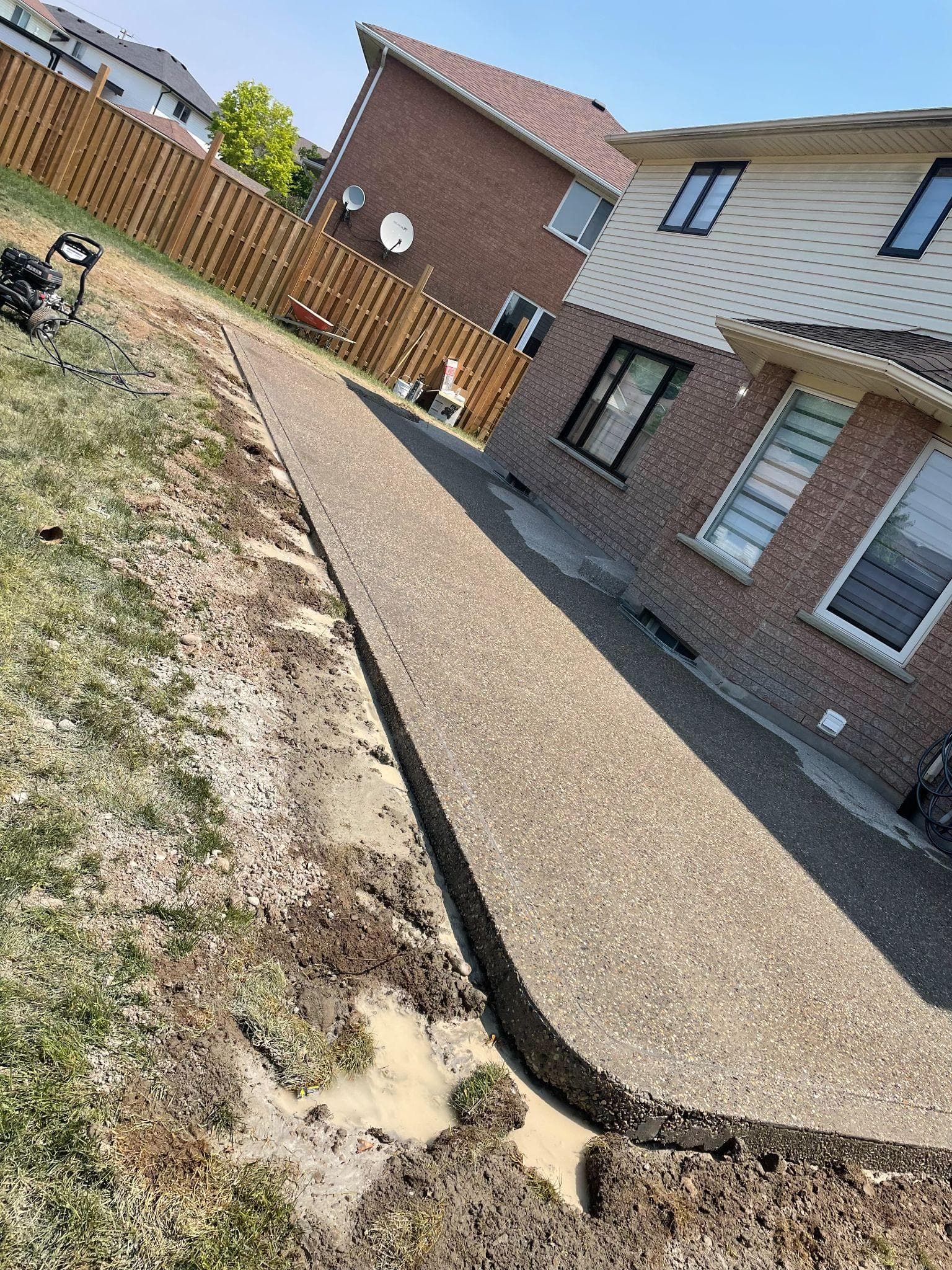 Exposed aggregate walkway · K-W — decorative concrete work by IronGround in Kitchener-Waterloo