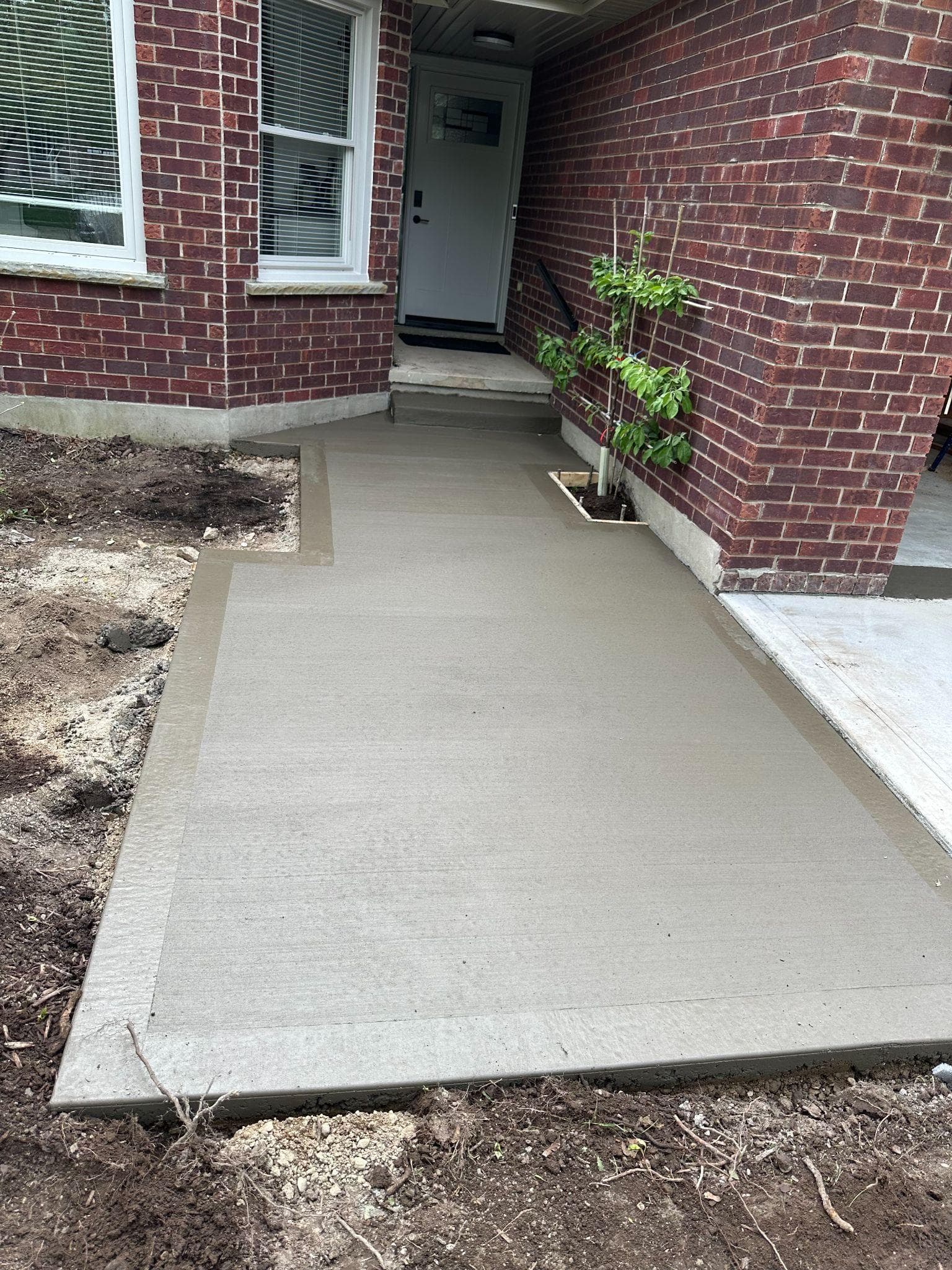 Front entry walkway · K-W — flatwork concrete work by IronGround in Kitchener-Waterloo