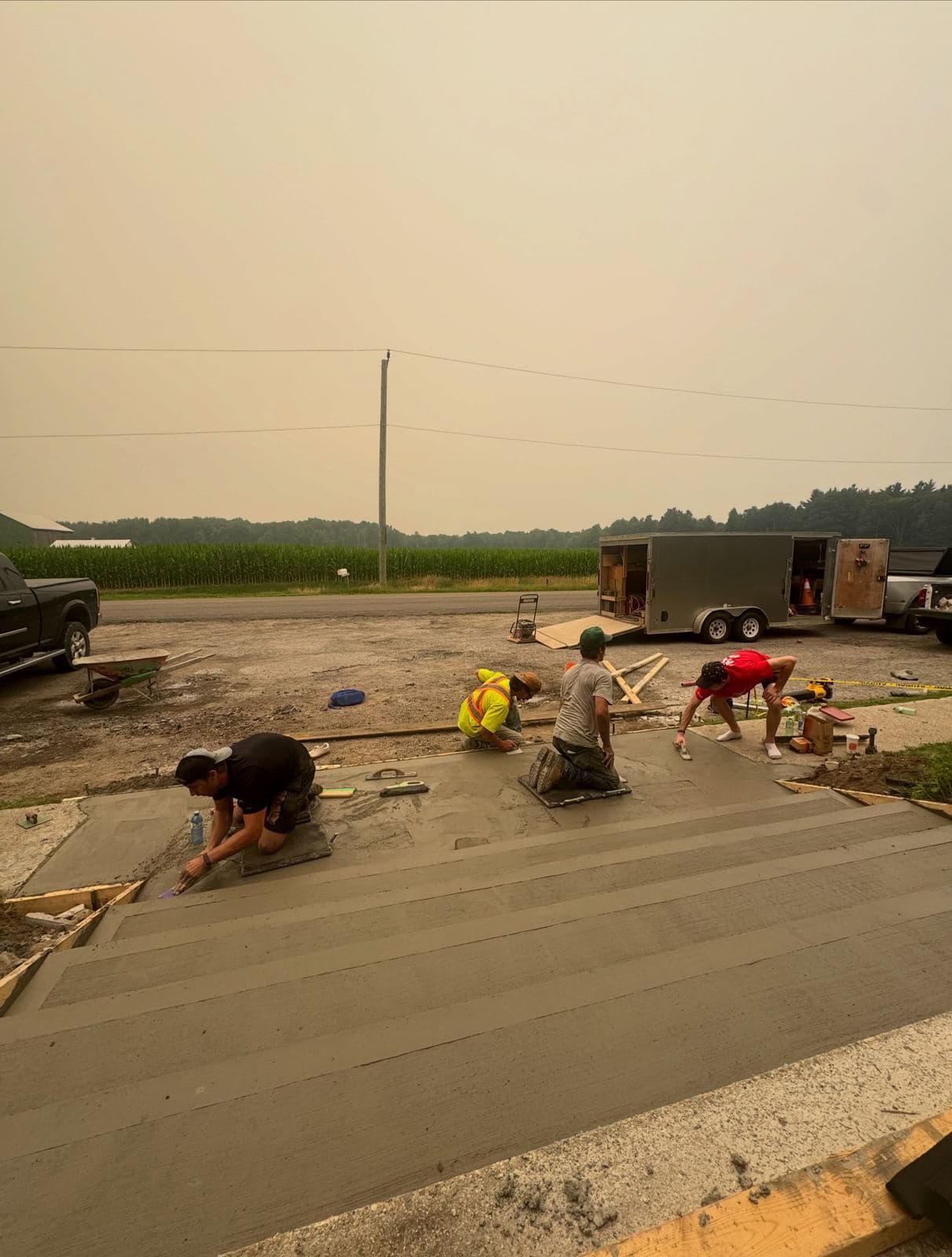 the Ironground crew finishing a large concrete slab