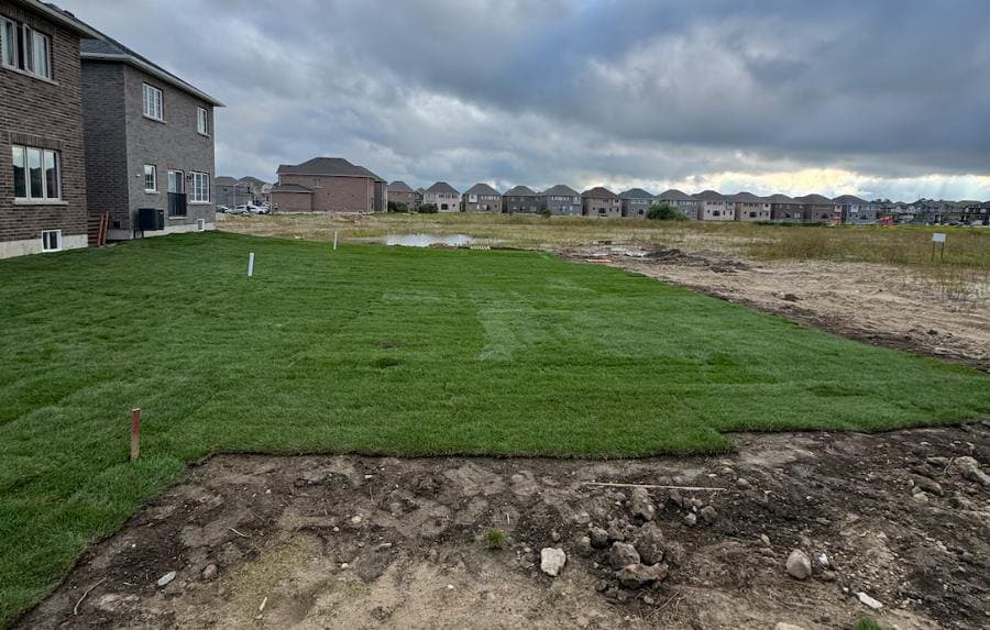 a finished graded and sodded builder lot on an Ironground subdivision program